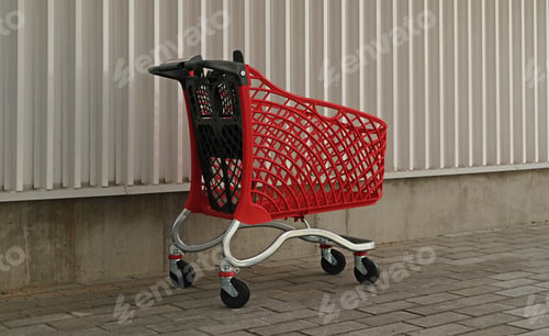 Preview: Empty red shopping on industrial wall background. Shop trolley at supermarket. Sale, discount, shopa