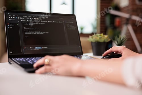 Preview: Programmer using terminal window with code