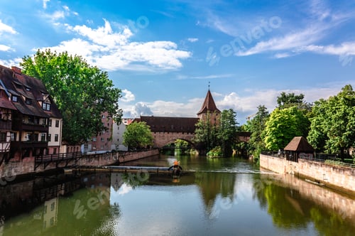 Preview: Colourful historic old town with half-timbered houses of Nuremberg. Bridges over Pegnitz river