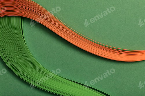 Preview: close up of green and orange abstract lines on green background