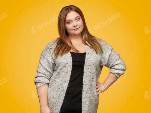 Preview: Confident overweight woman looking at camera