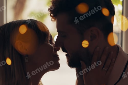 Preview: Romantic Couple Embrace Tenderly in Warm Light
