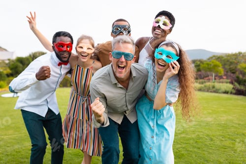 Preview: Portrait of happy african american couple with diverse friends embracing during wedding