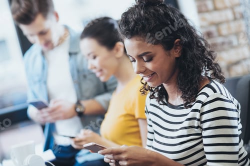 Preview: Social Media. Pretty Three Friends Using Smartphones While Smiling