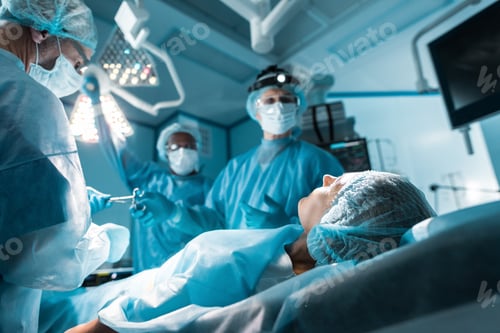 Preview: Surgeons Performing Operation on Patient in Operating Room
