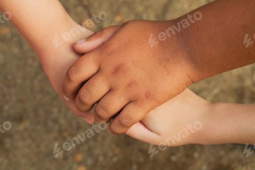 Preview: children of different nationalities holding hands, a symbol of friendship and peace