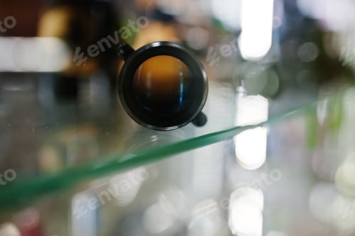Preview: Optical sight on shelves store weapons on shop center.