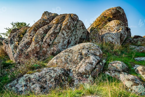 Preview: Huge deposits of stone minerals in a clearing bathed in warm sun