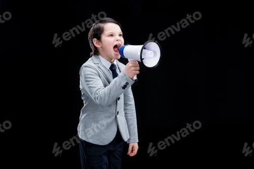 Preview: Angry Boy standing with megaphone and yelling isolated on black
