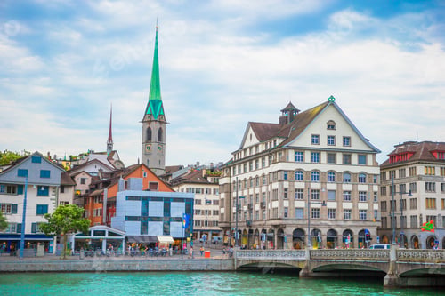 Preview: View of the historic city center of Zurich with famous Fraumunster Church and river Limmat