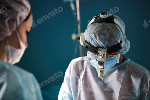 Preview: Surgeons in Masks Prepare for Operation