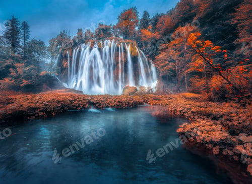 Preview: Waterfall in red forest in Plitvice Lakes, Croatia in autumn