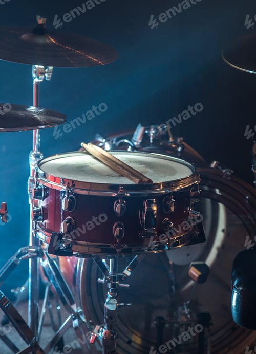 Preview: musical instruments drum kit, flash of light, a beautiful light in the background with copy space