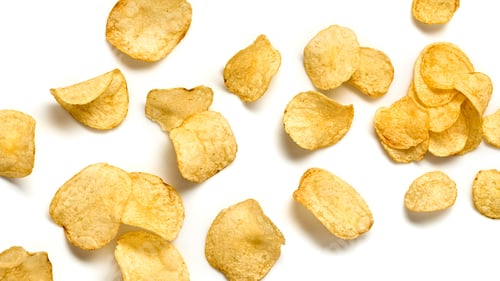 Preview: Potato chips flying in air cutout. Vegan beer snack isolated on white. Crispy veggie chip, falling c