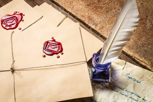 Preview: Closeup of vintage envelope and old letter written with blue ink