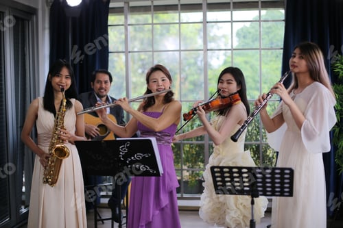 Preview: classic musical song student are learning to play a music instrument in sound studio musician class