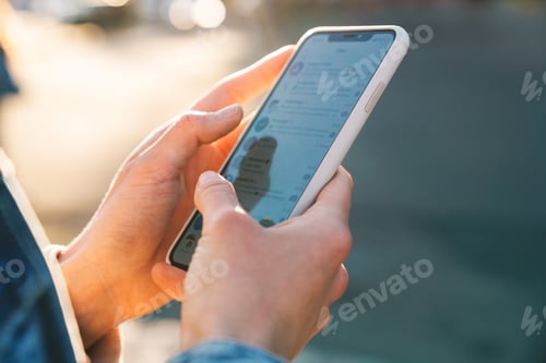 Preview: Close up of a woman using mobile phone