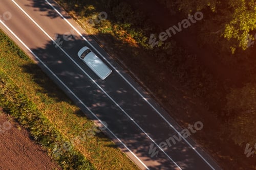 Preview: White van on the road, top down aerial view from drone pov