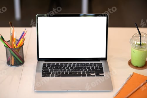 Preview: Front view laptop blank white screen placed at the café. Mock up.
