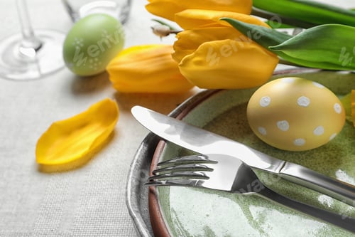 Preview: Festive Easter table setting with painted eggs, closeup. Space for text