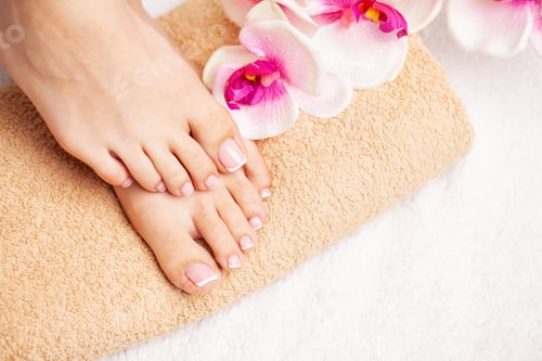 Preview: Close up of beautiful legs of a woman doing a pedicure