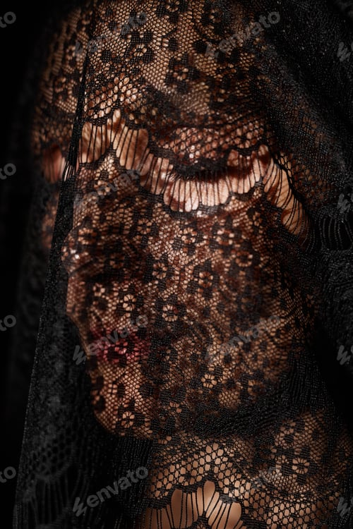 Preview: Woman with Eyes Closed in Lace Veil Covering Face in Studio