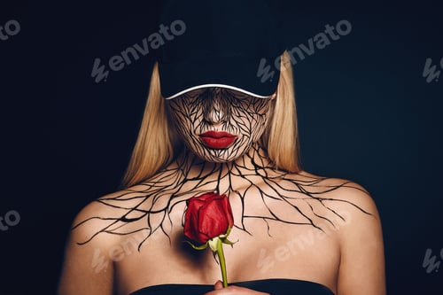 Preview: Fashion Portrait Of Girl With Faceart And Red Lips. Picture Taken In The Studio On A Black