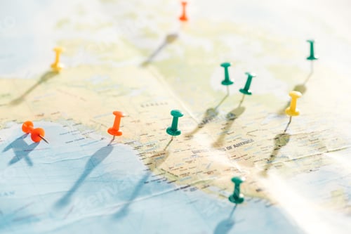 Preview: selective focus of world map with colorful push pins