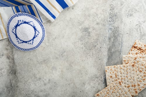 Preview: Passover celebration concept. Matzah, red kosher and walnut. Traditional ritual Jewish bread matzah,