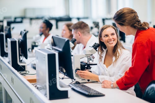 Preview: Science students engaged in microscopy lab work