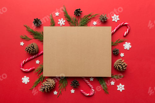 Preview: Flat lay Christmas composition. square Paper blank, pine tree branches, christmas