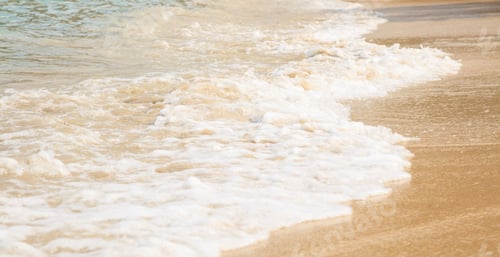 Preview: Calm waves on a sandy beach