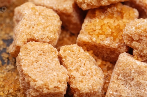 Preview: Brown cane sugar cubes isolated on white background