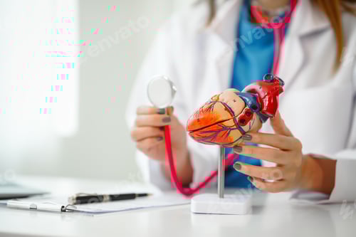 Preview: Female doctor provides crucial guidance to a male patient in clinic room, heart attack prevention