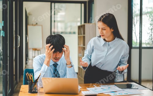 Preview: Stressed Man Receiving Direction in an Office Setting