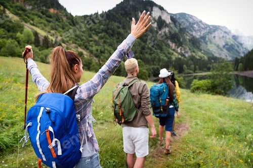 Preview: Adventure, travel, tourism, hike and people concept. Group of happy friends with backpack outdoors