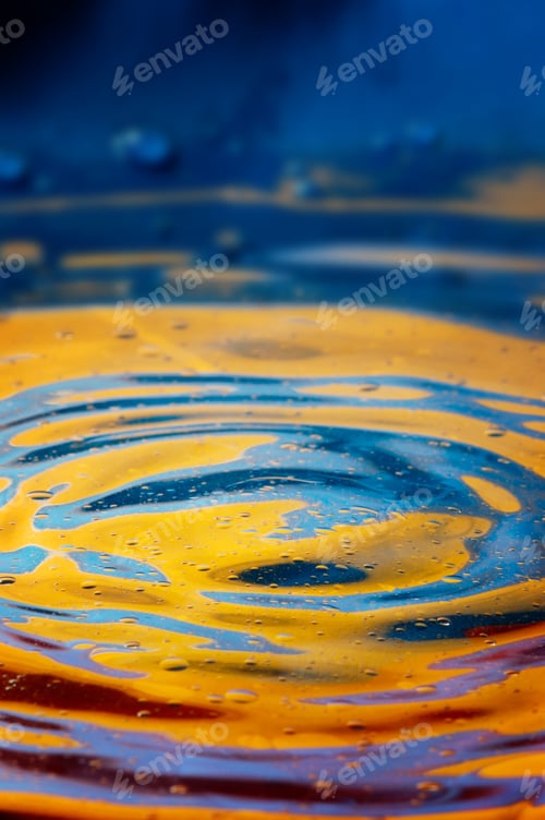 Preview: Close-up view on blue and yellow aquarelle paint like Ukrainian flag