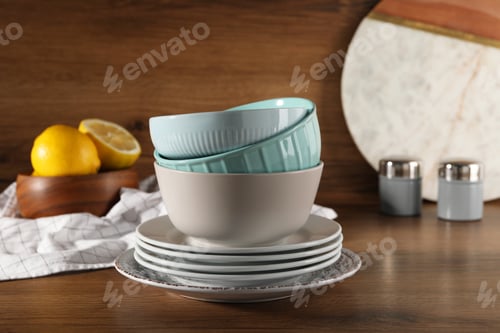 Preview: Stack of beautiful tableware on wooden table