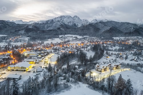 Preview: Zakopane townscape in winter at sunrise, aerial drone view
