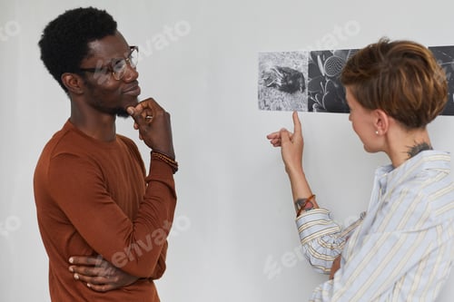 Preview: People Discussing Modern Art in Museum