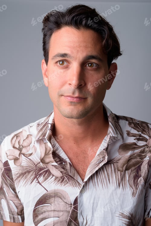 Preview: Face of handsome Hispanic tourist man thinking and looking up