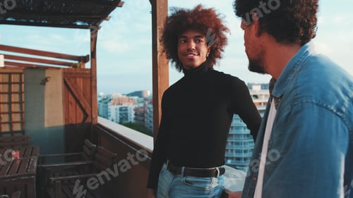 Preview: Diverse young guys spend time together on the terrace