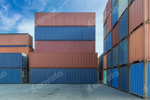 Preview: Stack of containers in a harbor. Shipping containers stacked on cargo ship.