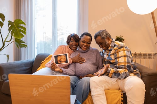 Preview: African american family of three making a video call