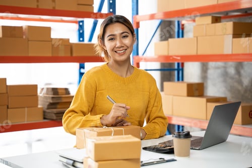 Preview: female entrepreneurs check online orders to prepare to pack the boxes, sell to customers