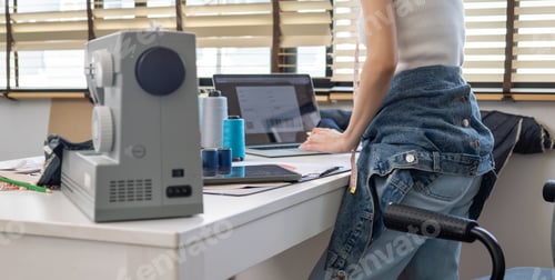 Preview: Fashion designer enjoying with process of creating new clothes