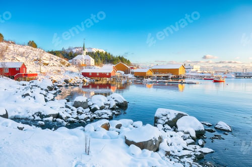 Preview: Awesome winter scenery of Moskenes village with ferryport and famous Moskenes parish Churc