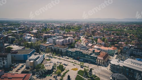 Preview: Aerial shot of a city with roads and buildings