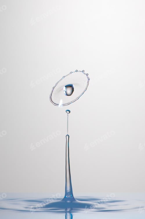 Preview: Splash of colorful liquid with high speed flash