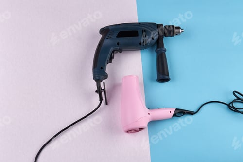 Preview: Power drill and hair dryer on colored background.